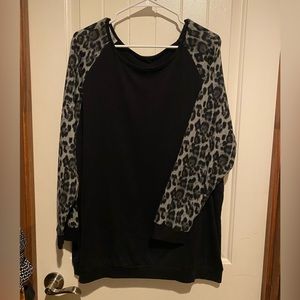 Tunic with animal print sleeves